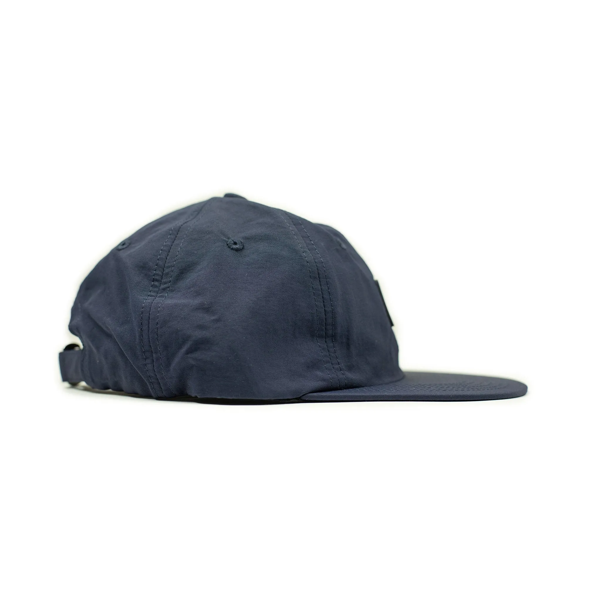 Baseball cap in navy nylon with tonal patch