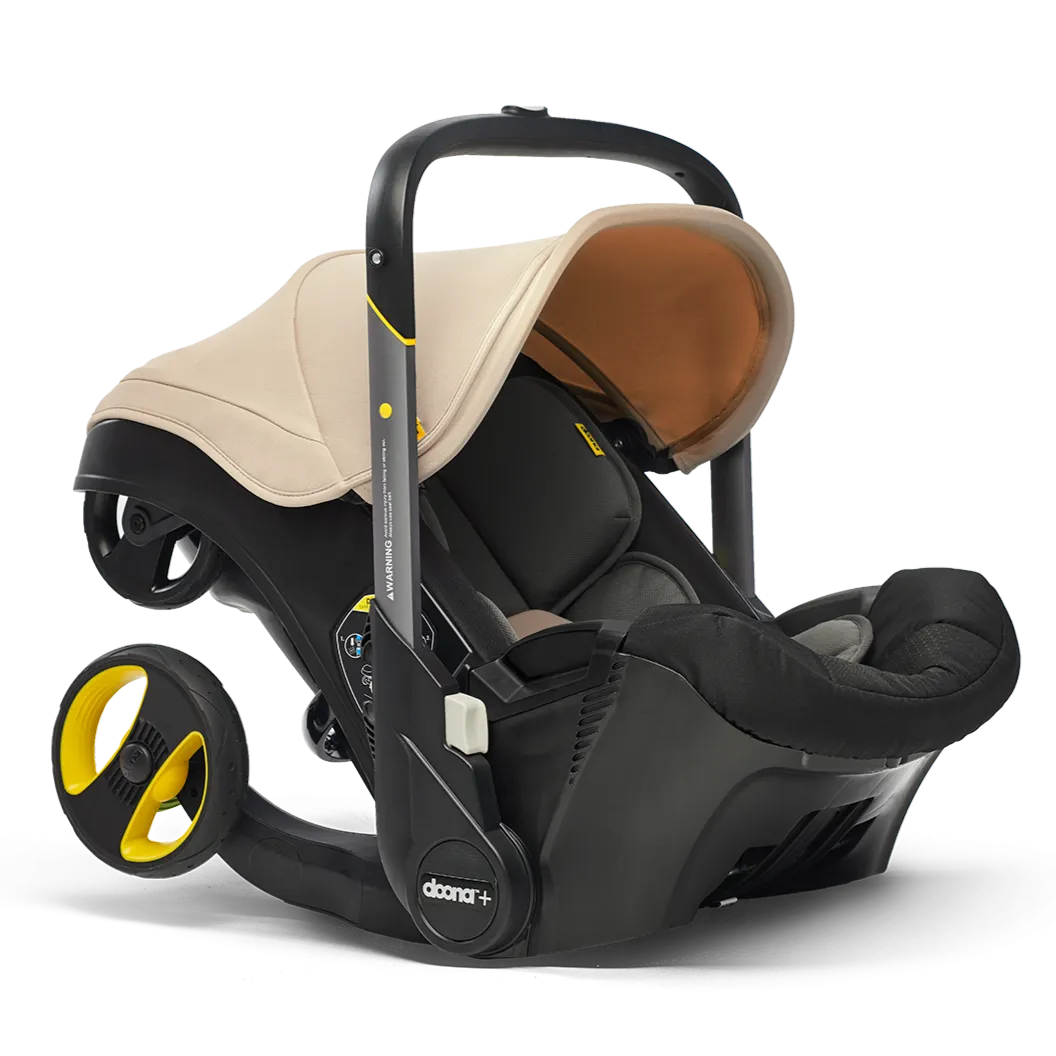 Doona - Infant Car Seat   Stroller   Base - Sahara Sand